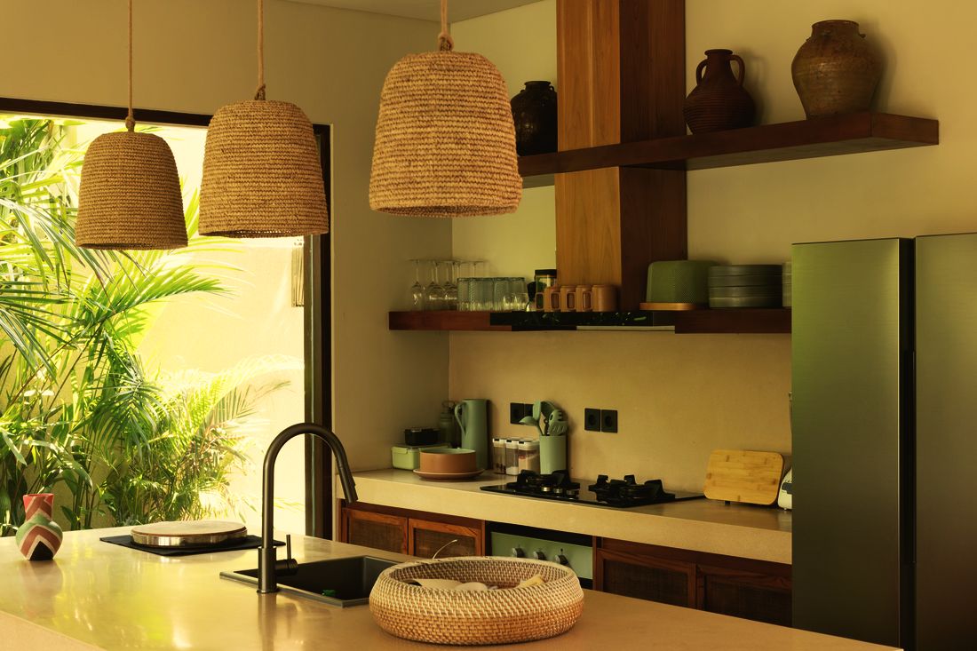 Kitchen with woven pendant lamps