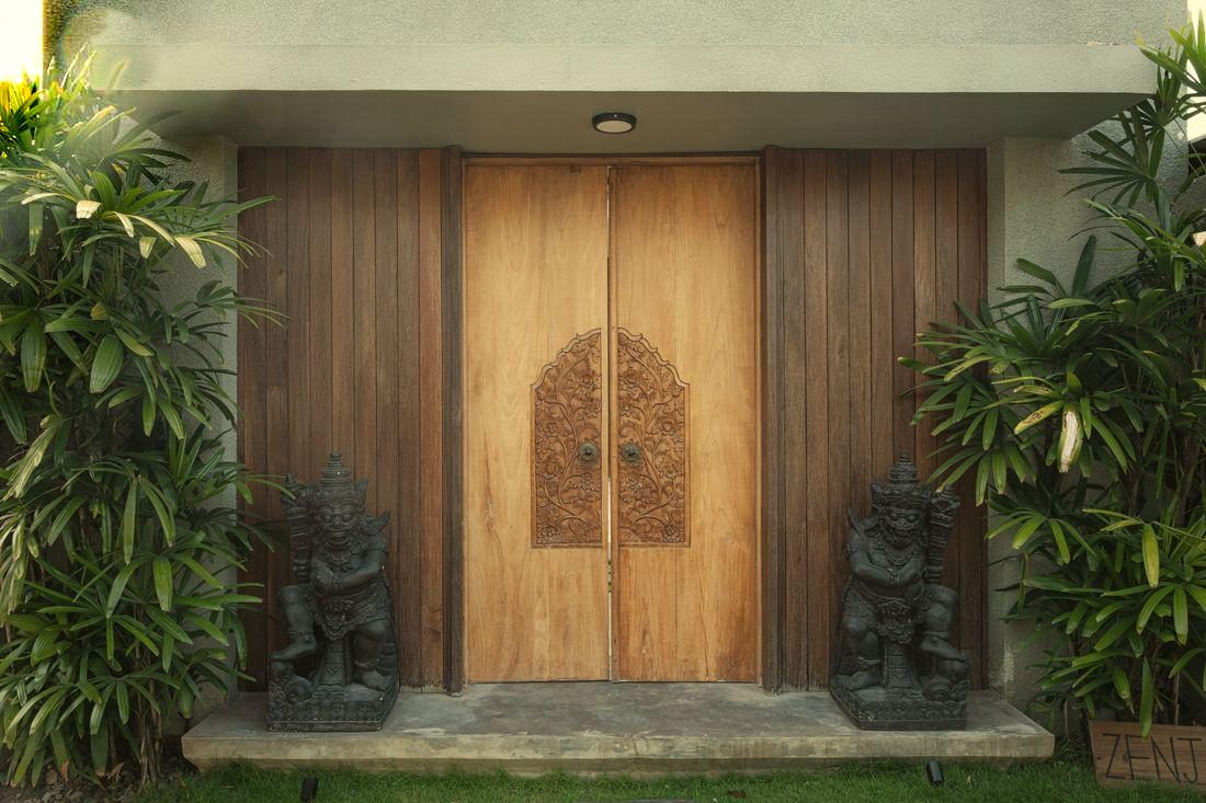Carved timber entrance doors